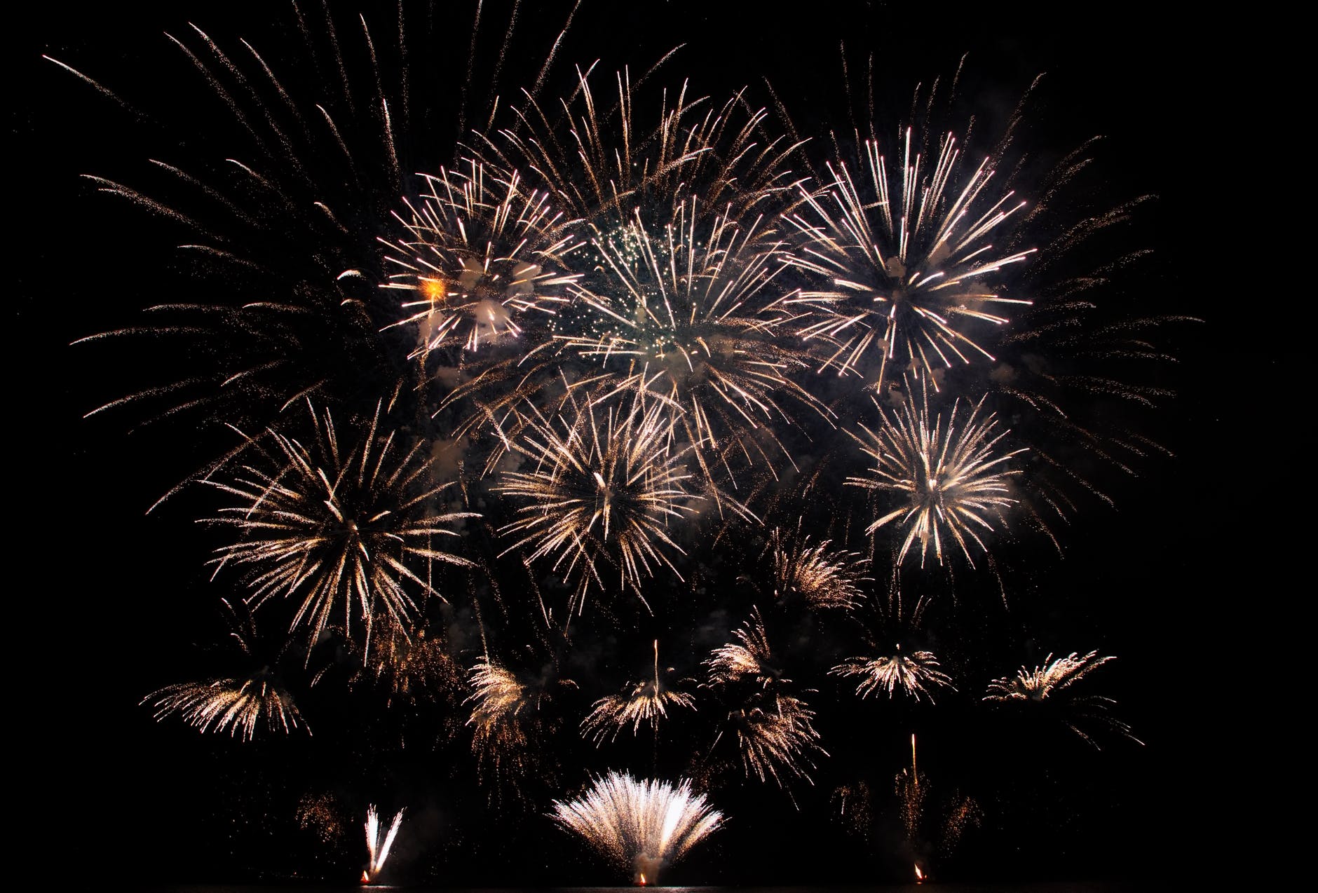 sparkling bright fireworks in black sky