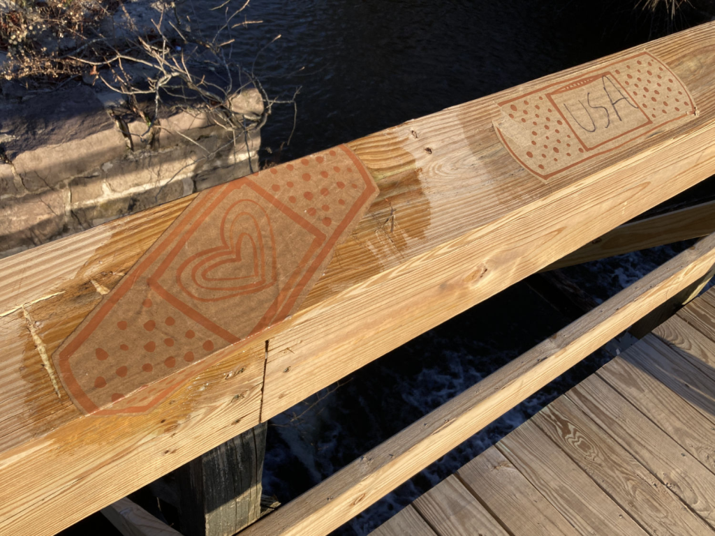image 9 - Bucks County Beacon - Lambertville Artist Practices Creative Resistance to Transform MAGA Vandalism at a Local Park
