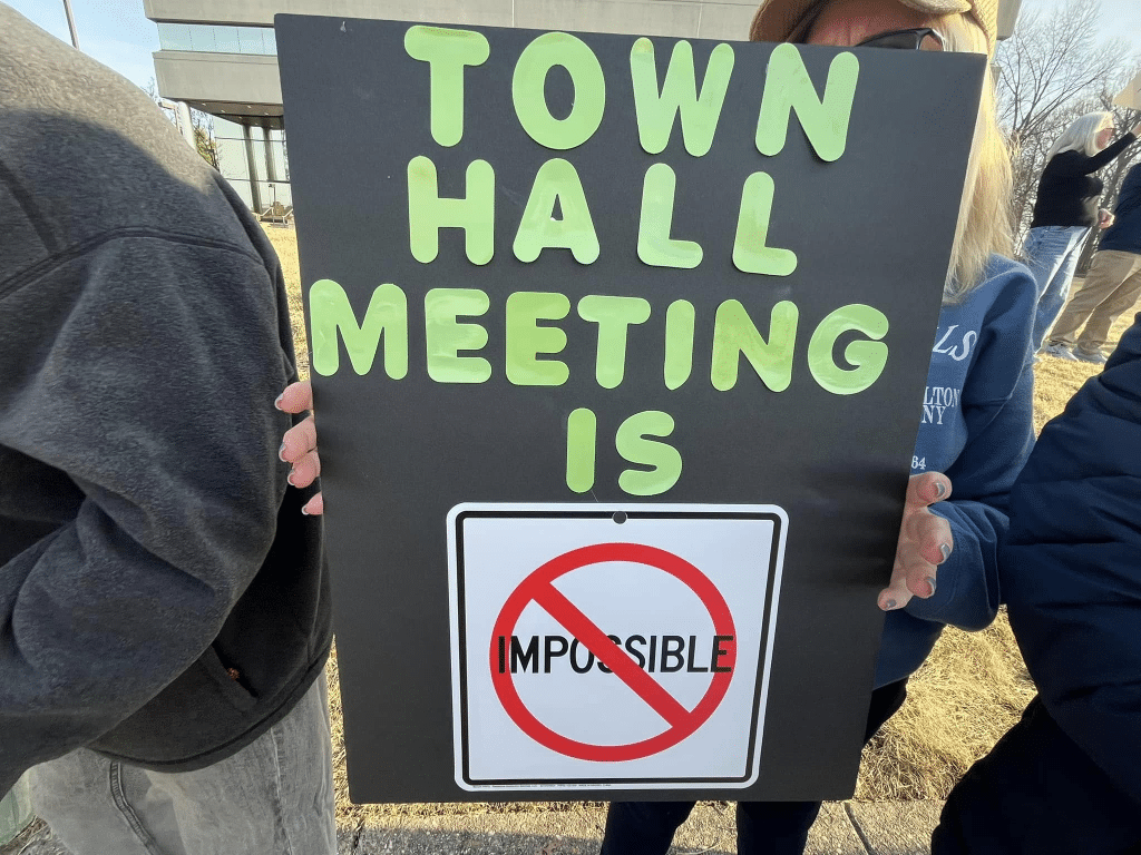 image 7 - Bucks County Beacon - Photo Essay: Bucks County Residents Protest Republican Congressman Brian Fitzpatrick for St. Patrick's Day