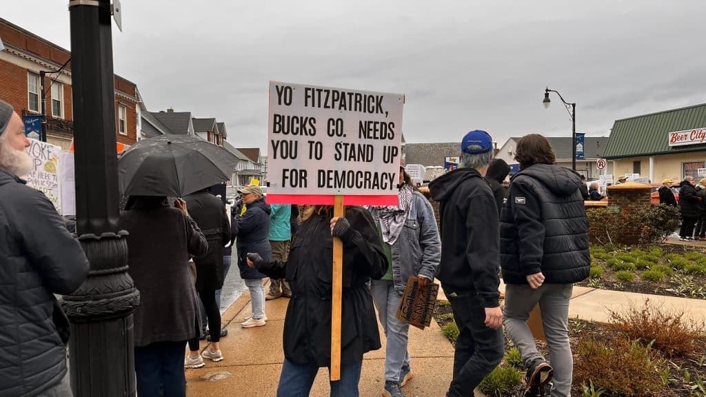 Ftizpatrick Needs to Stand Up sign - Bucks County Beacon - Photo Essay: ‘Hands Off’ Quakertown Rally Draws 1,000 Protesters