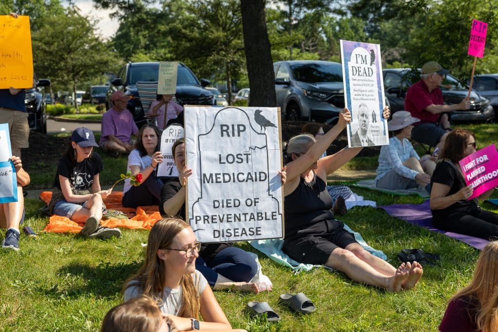 Indivisible DIE IN 10 - Bucks County Beacon - PHOTO ESSAY: Hundreds Participate in Die-in at Congressman Brian Fitzpatrick’s Office to Highlight Deadly Stakes of GOP Budget