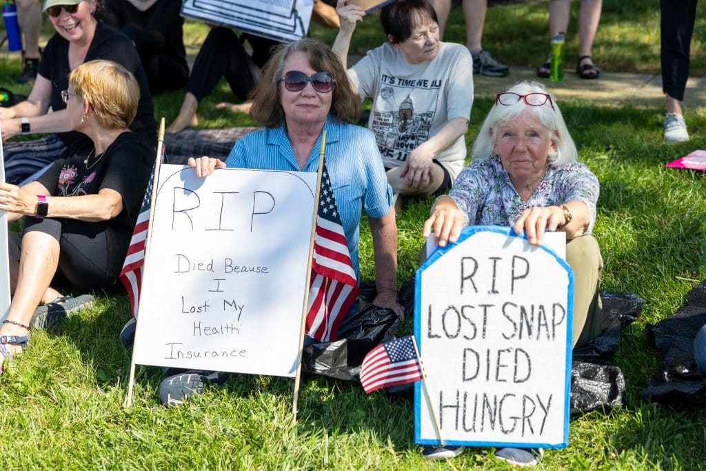 Indivisible DIE IN 7 - Bucks County Beacon - PHOTO ESSAY: Hundreds Participate in Die-in at Congressman Brian Fitzpatrick’s Office to Highlight Deadly Stakes of GOP Budget