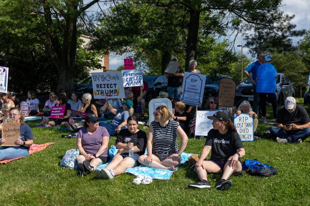 Indivisible DIE IN FITZ 6 - Bucks County Beacon - PHOTO ESSAY: Hundreds Participate in Die-in at Congressman Brian Fitzpatrick’s Office to Highlight Deadly Stakes of GOP Budget